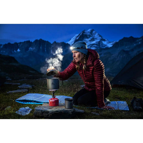 MSR Titan Kettle being used in Swiss Alps with camping stove