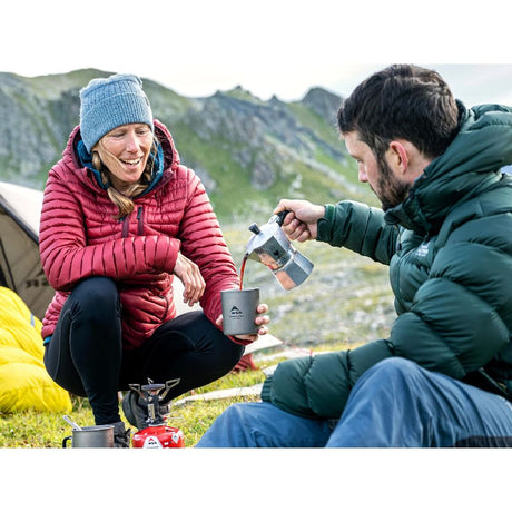 MSR Titan Double Wall Mug being used for coffee
