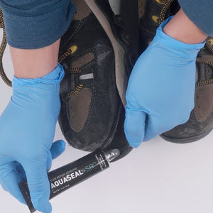 Gear Aid Aquaseal SR Shoe Repair Adhesive in use on shoe sole