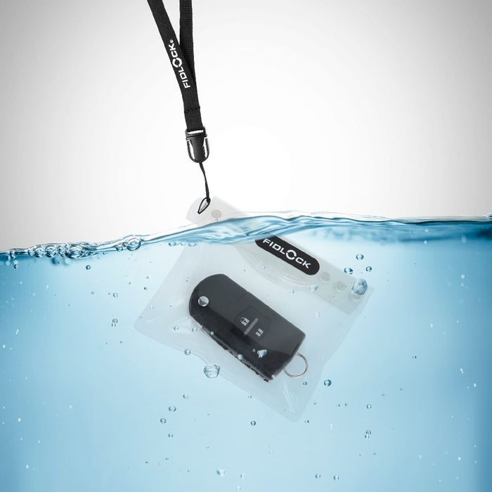Fidlock Waterproof Dry Case Mini with key submerged in water