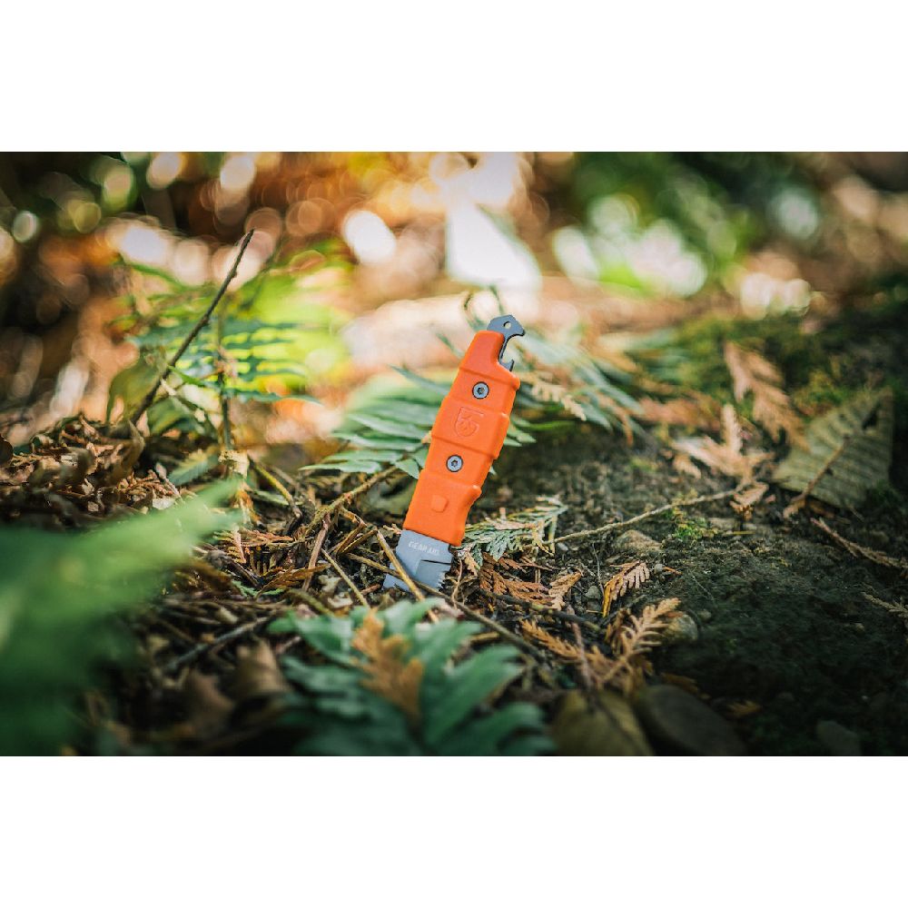 Gear Aid Buri Utility Knife stuck in forest floor