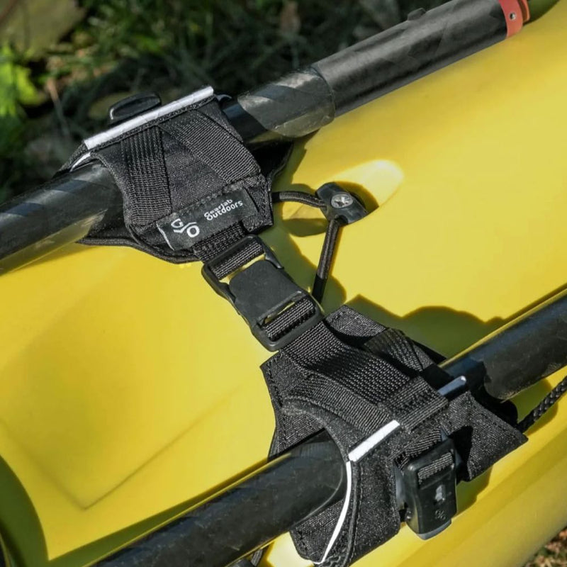 Gearlab Paddle Clutch mounted on kayak holding paddles